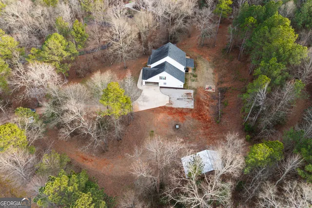 a view of a house with a swimming pool