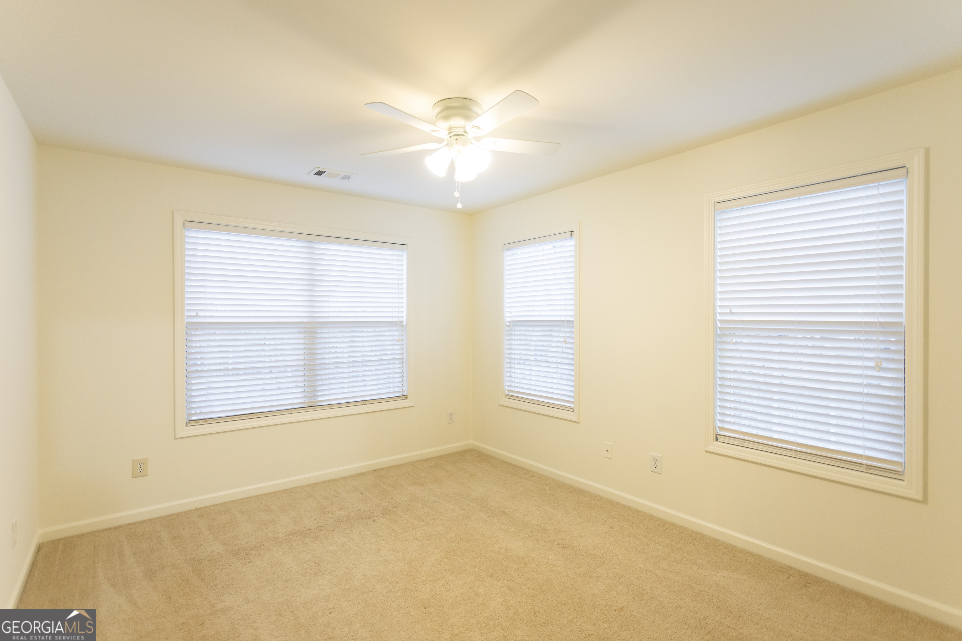 931 Bethany Road Covington, GA 30016 - Photo 59 of 83 a view of an empty room with a window