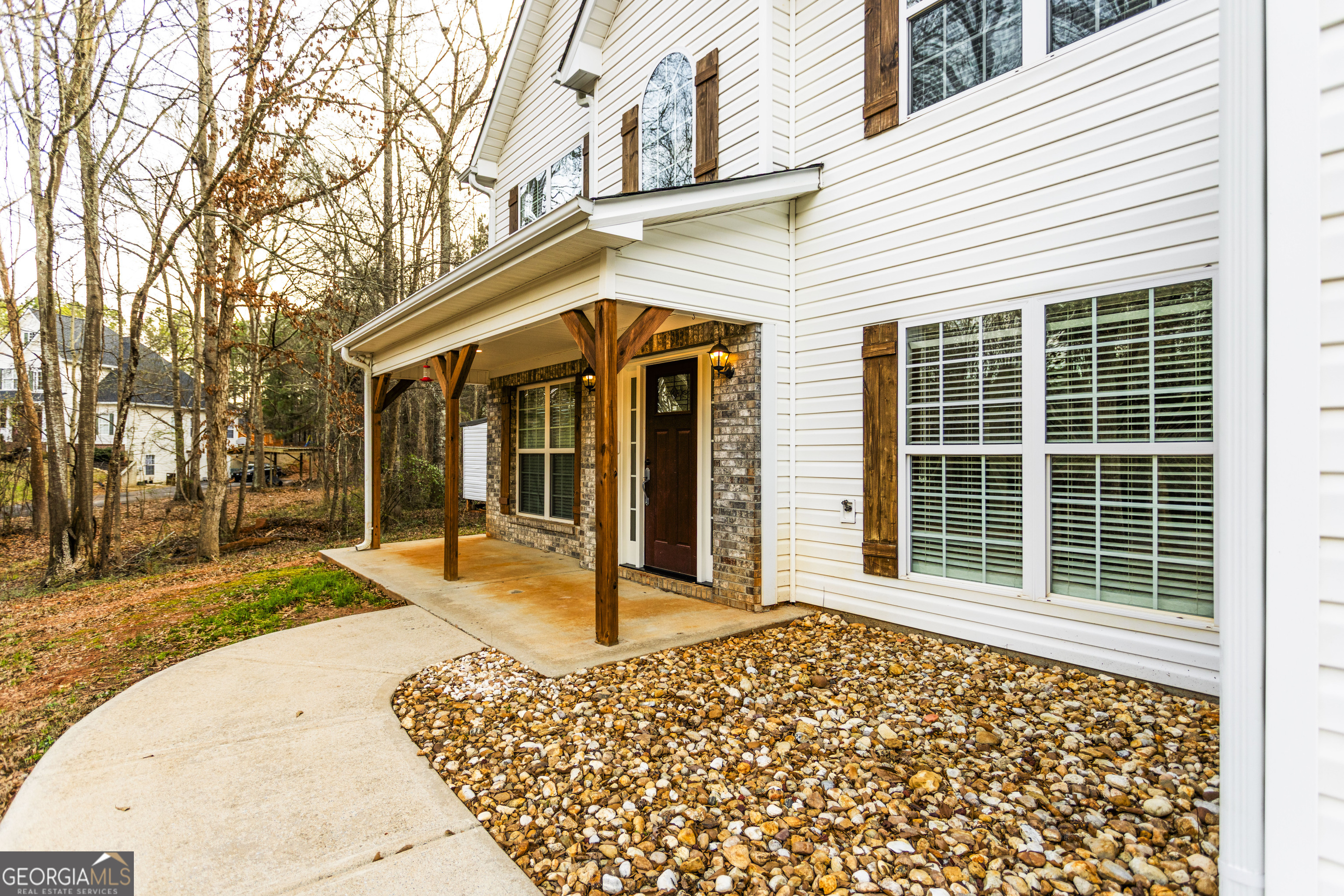 931 Bethany Road Covington, GA 30016 - Photo 8 of 83 a view of a house with a porch