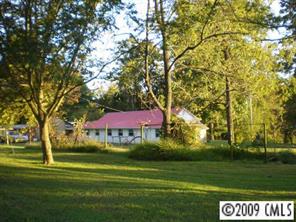 1093 Hopewell Church Road Hiddenite, NC 28636 - Photo 1 of 8 a view of a park with large trees