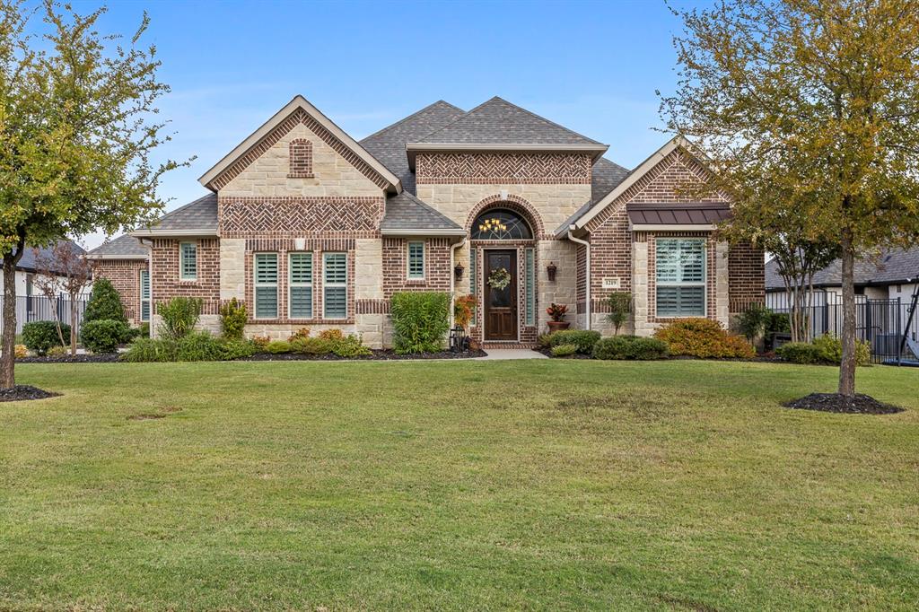 1219 Logan Trail Lucas, TX 75002 - Photo 1 of 1 a front view of a house with a yard