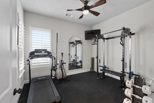a view of a refrigerator and washer in a room