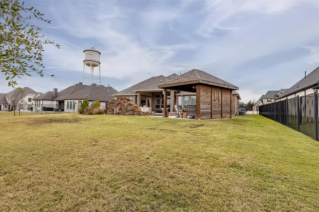 an aerial view of a house with a garden