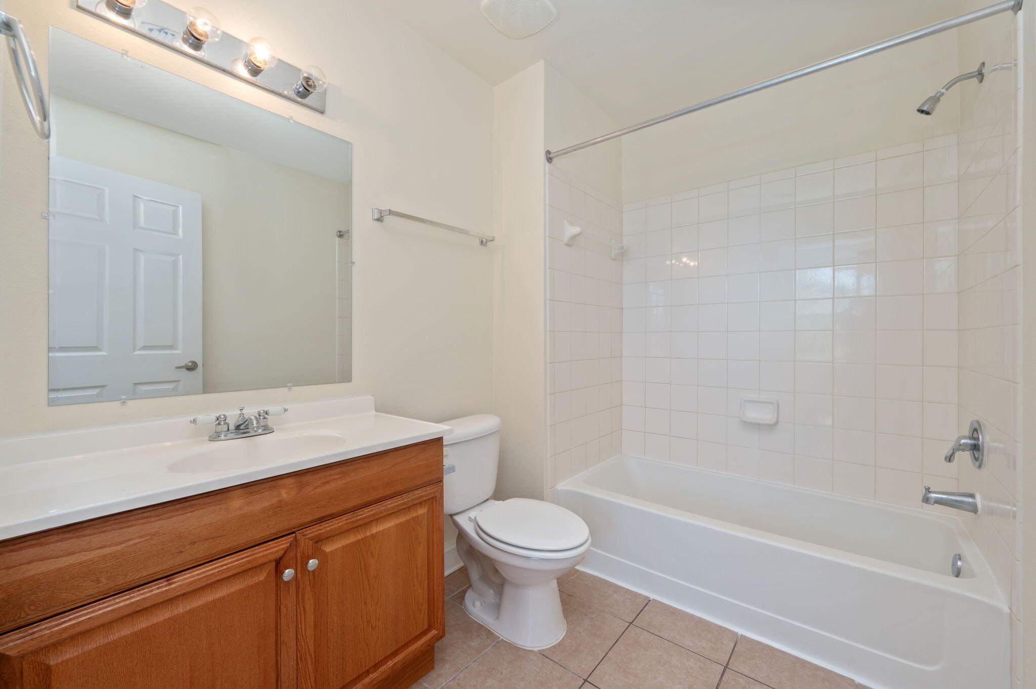 535 Wingspan Way Crestview, FL 32536 - Photo 13 of 26 a bathroom with a sink a toilet and shower