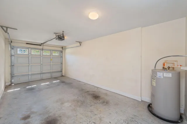 a kitchen with a stove and a microwave