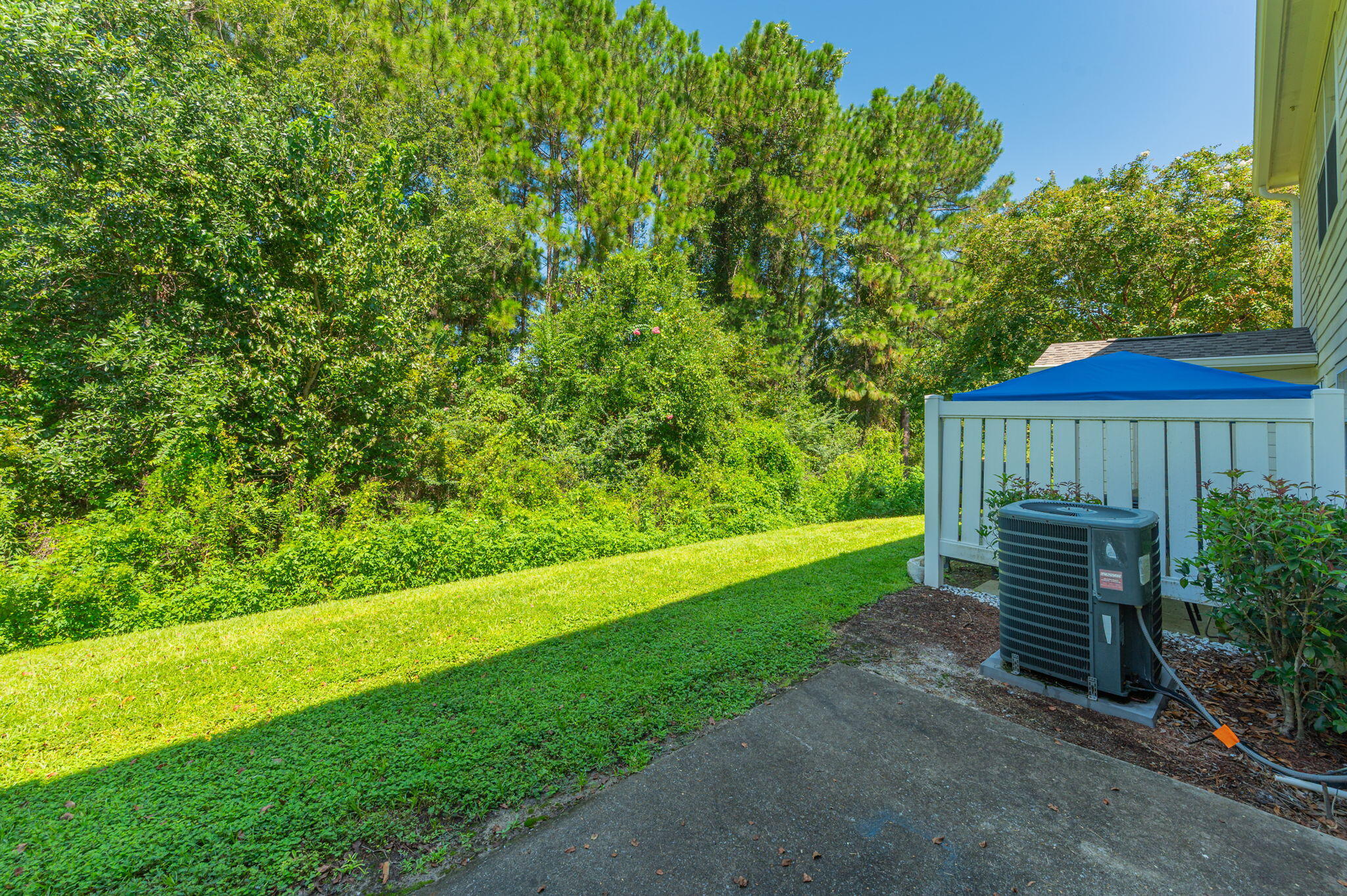 535 Wingspan Way Crestview, FL 32536 - Photo 4 of 26 a view of a backyard with wooden fence