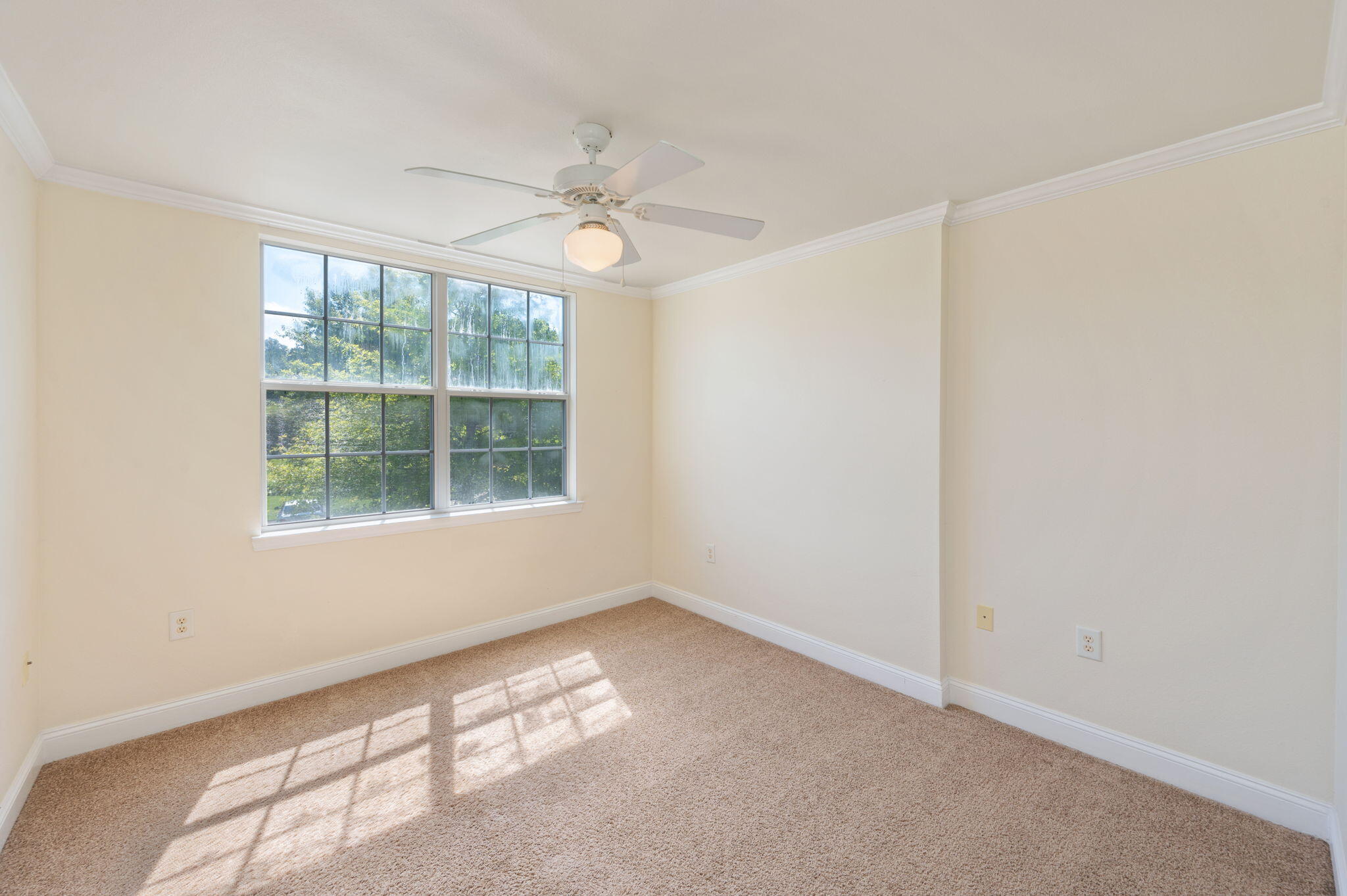 535 Wingspan Way Crestview, FL 32536 - Photo 7 of 26 an empty room with a window