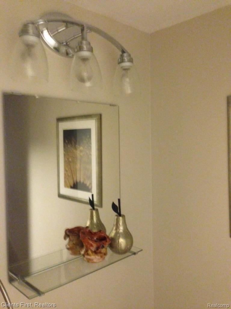 1665 Riverside Drive, Unit 8 Rochester, MI 48309 - Photo 18 of 25 half bath lighting.jpg