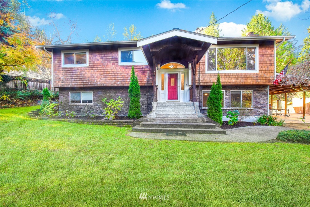 13621 196th Avenue Southeast Renton, WA 98059 - Photo 2 of 31 a front view of house with yard and outdoor seating