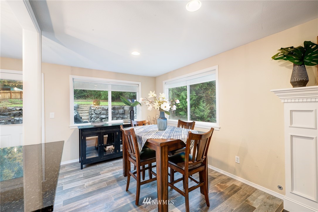 13621 196th Avenue Southeast Renton, WA 98059 - Photo 11 of 31 a view of a dining room with furniture window and outside view