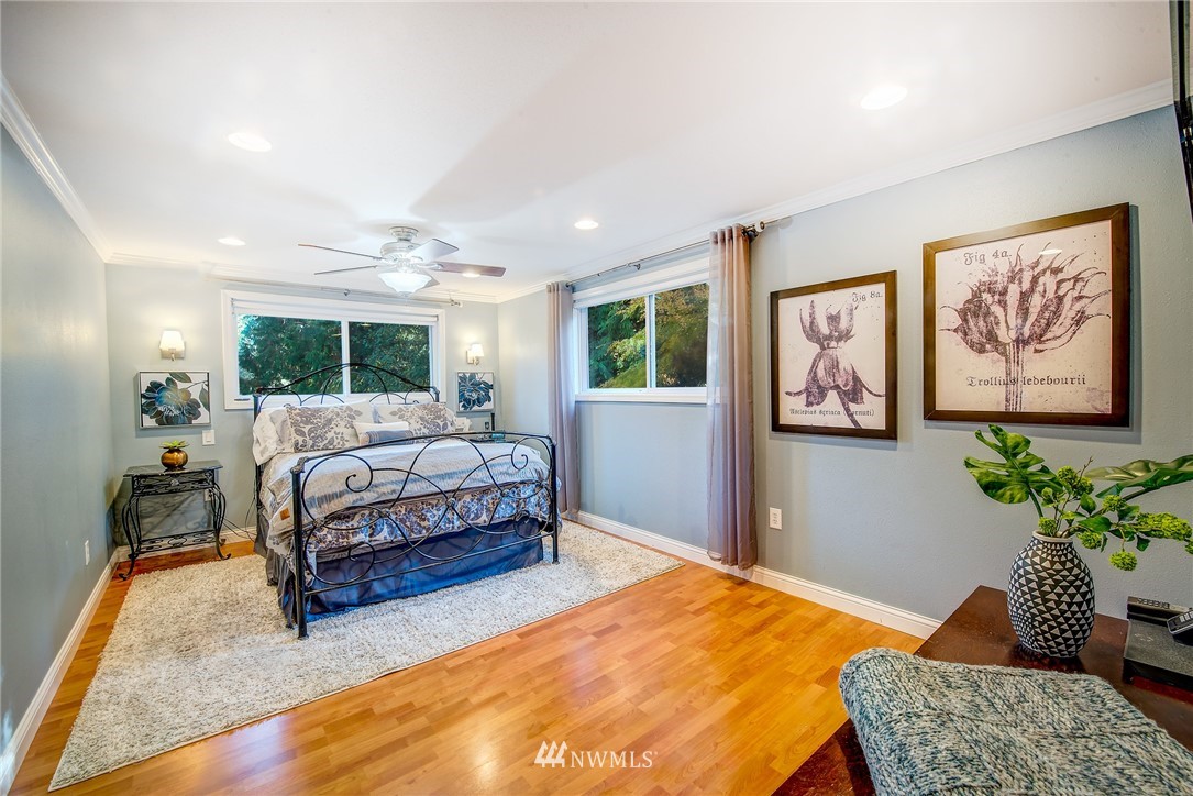 13621 196th Avenue Southeast Renton, WA 98059 - Photo 12 of 31 a bedroom with a bed furniture and window