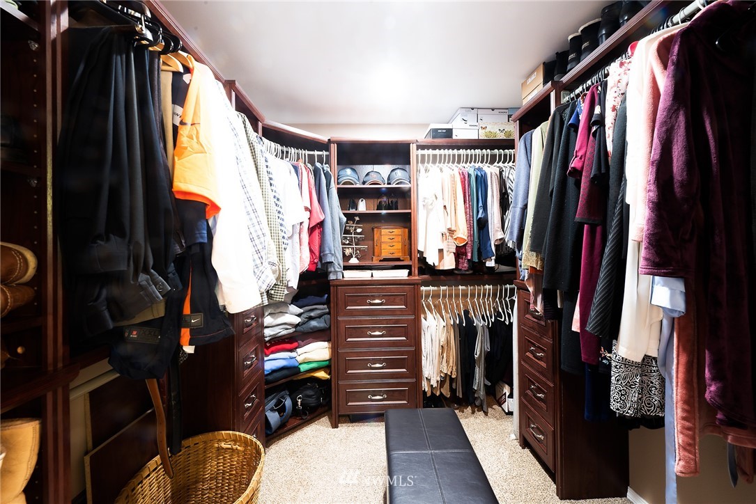 13621 196th Avenue Southeast Renton, WA 98059 - Photo 13 of 31 a view of walk in closet with clothes and shoes