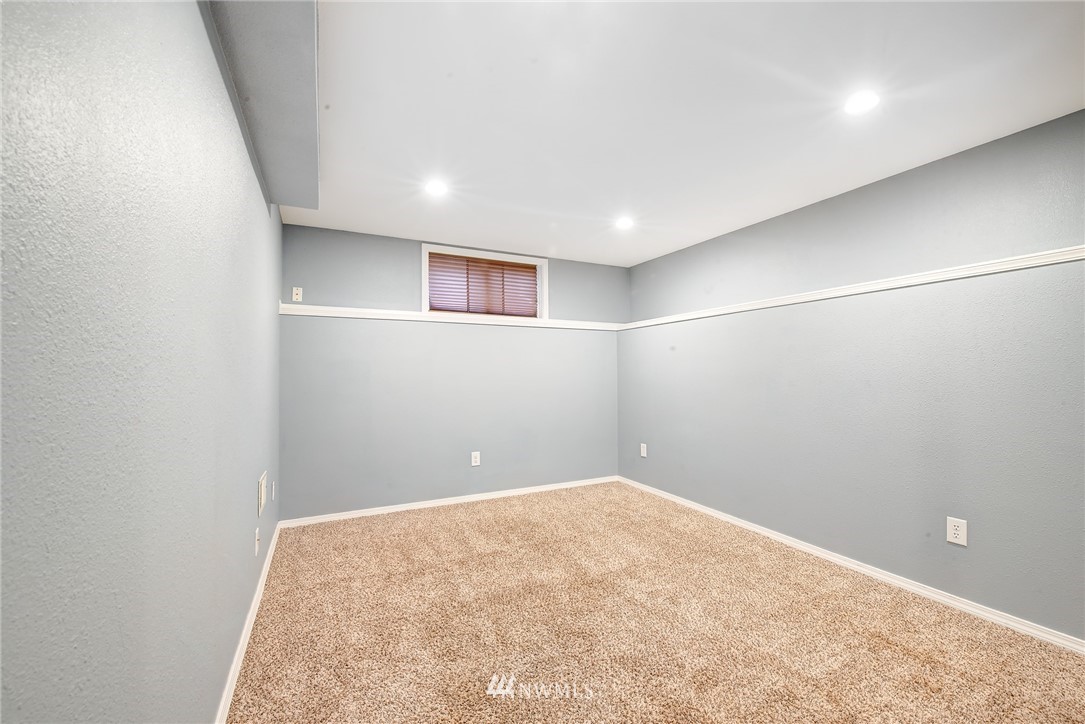 13621 196th Avenue Southeast Renton, WA 98059 - Photo 18 of 31 an empty room with a workbench