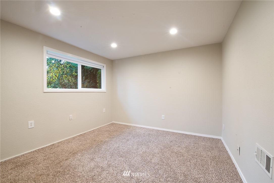 13621 196th Avenue Southeast Renton, WA 98059 - Photo 19 of 31 an empty room with windows