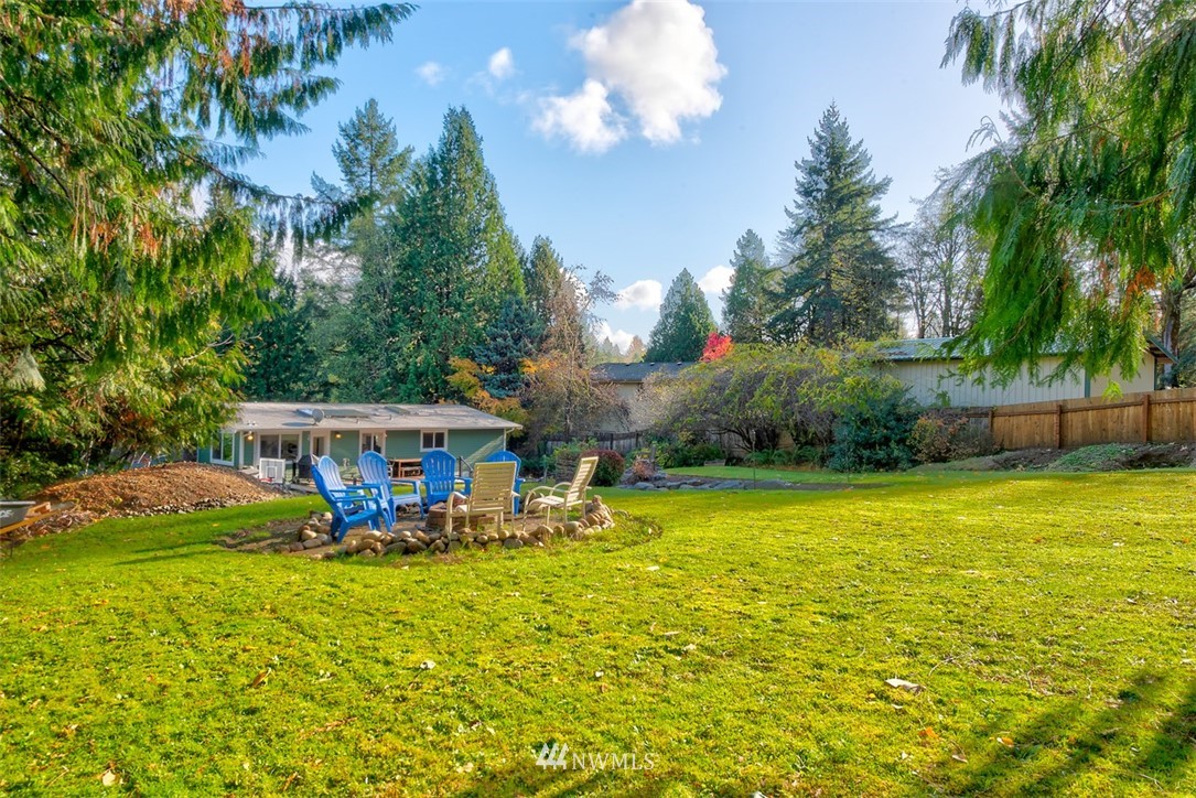 13621 196th Avenue Southeast Renton, WA 98059 - Photo 27 of 31 a view of an house with swimming pool garden and patio
