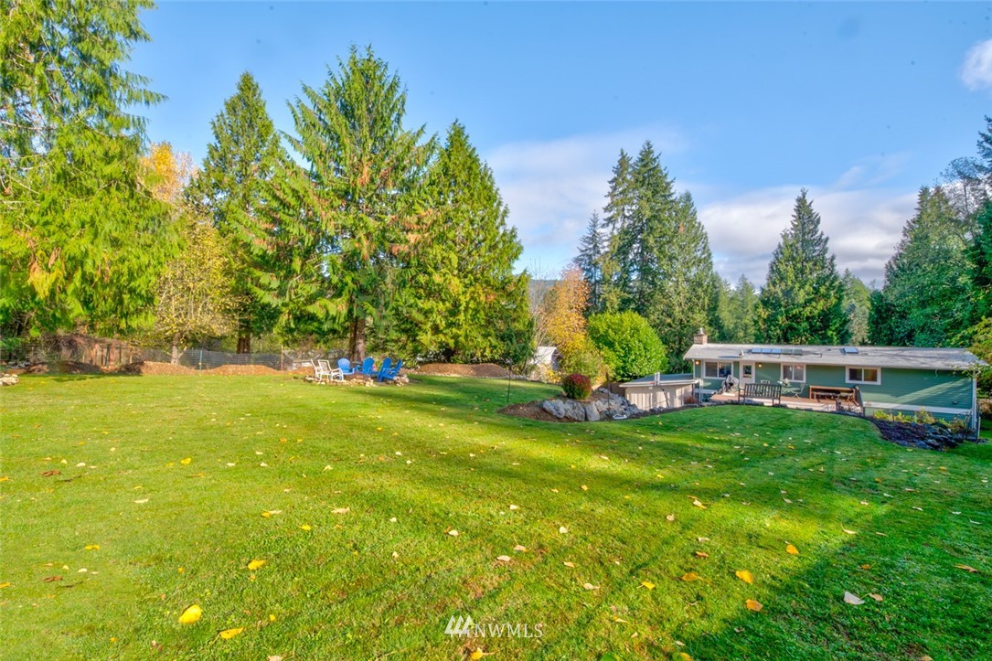 13621 196th Avenue Southeast Renton, WA 98059 - Photo 28 of 31 a view of a house with a backyard