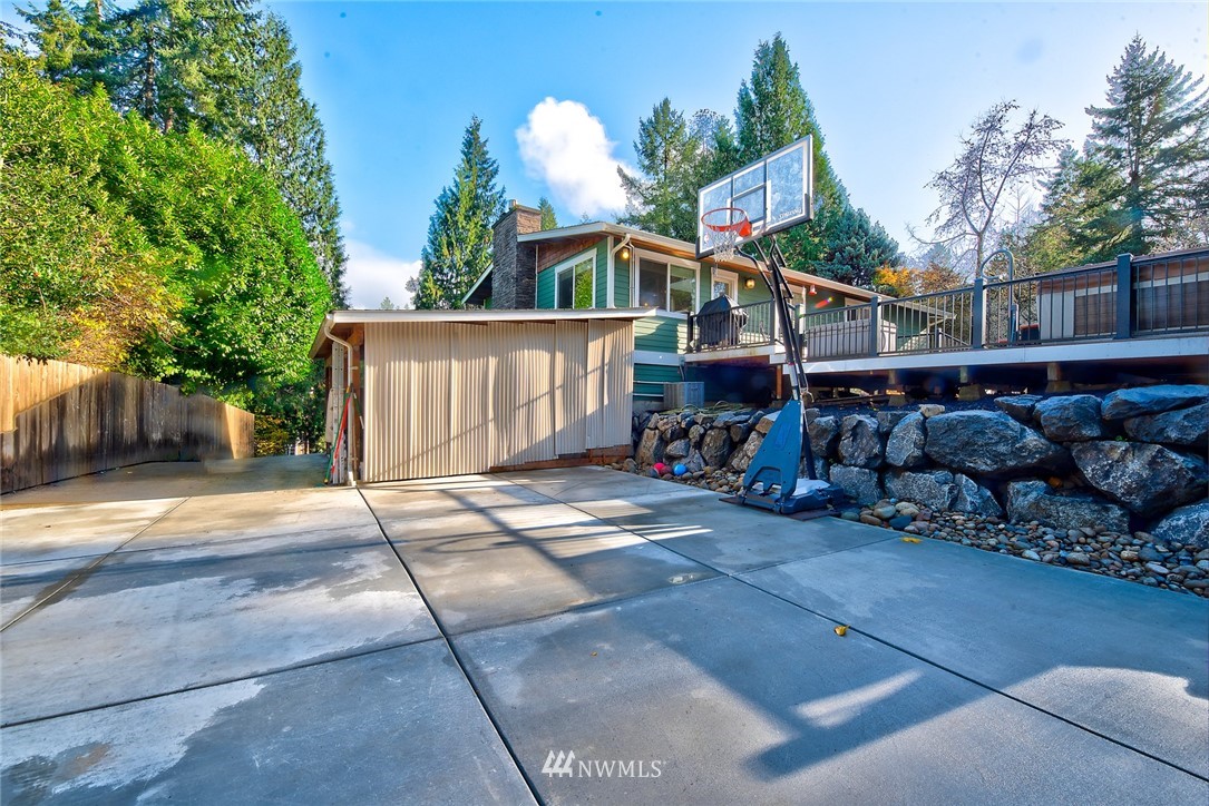 13621 196th Avenue Southeast Renton, WA 98059 - Photo 29 of 31 a view of a house with wooden fence