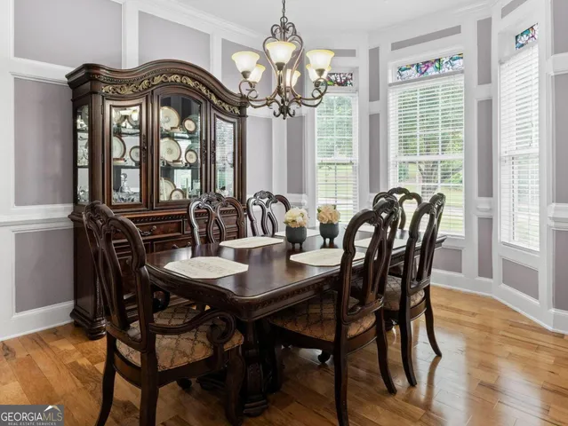 a view of gallery with wooden floor