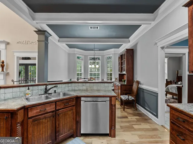 a living room with furniture fireplace and flat screen tv