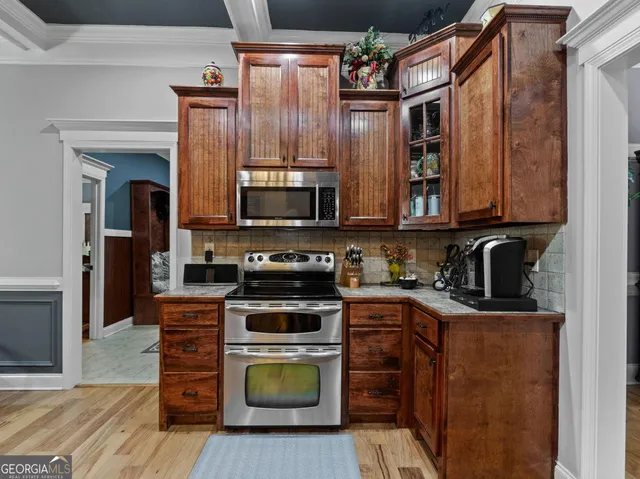 a living room with furniture fireplace and flat screen tv