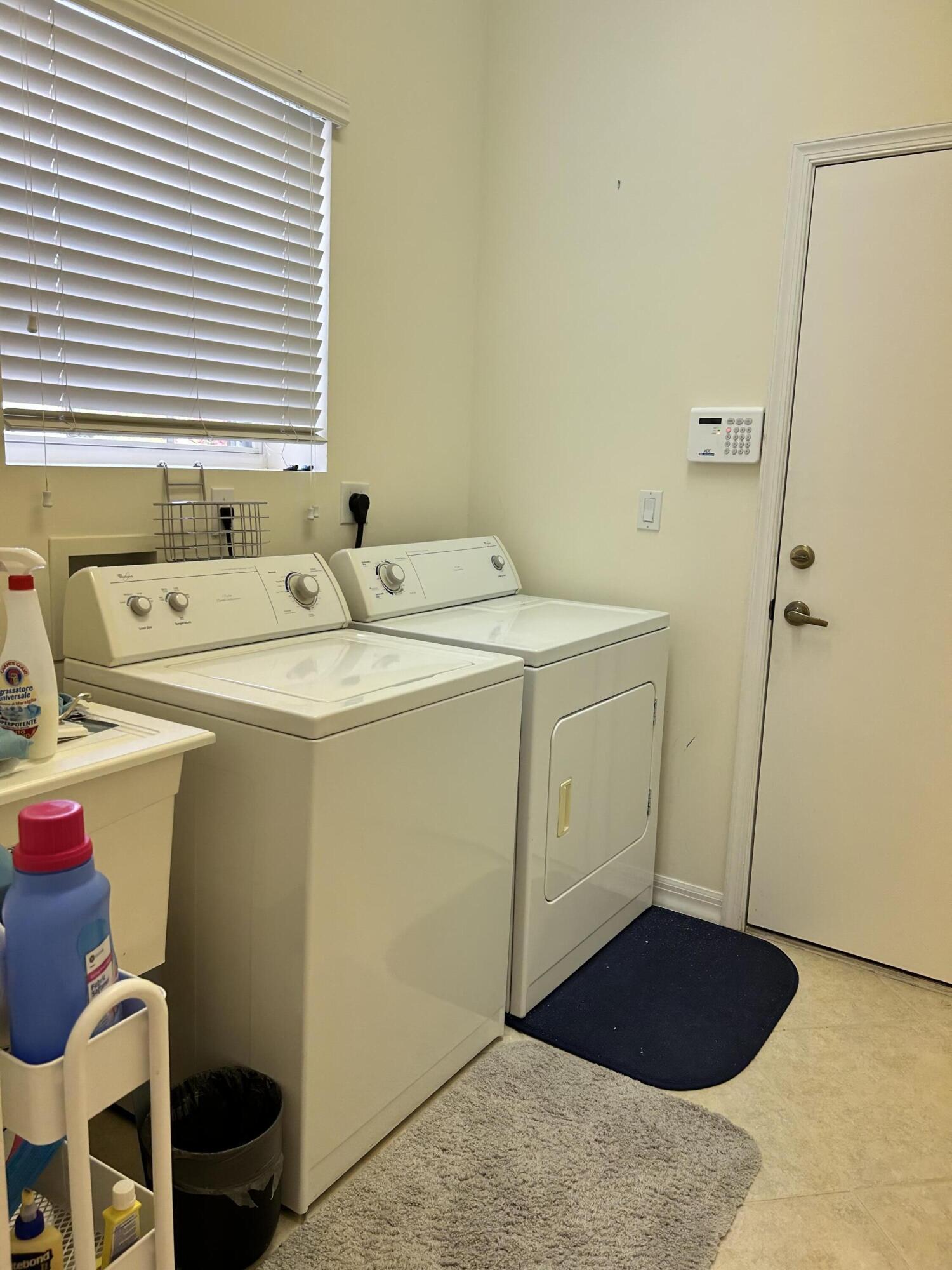 7024 Southeast Cricket Court Stuart, FL 34997 - Photo 10 of 11 Washer / Dryer