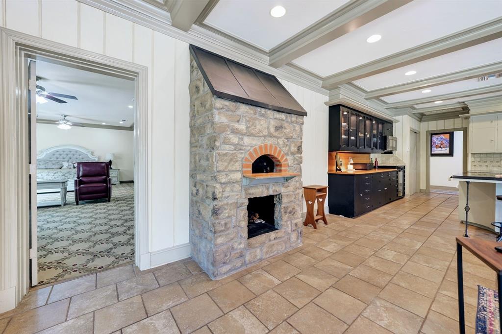 1901 Rose Pointe Athens, TX 75752 - Photo 15 of 37 Stone-clad pizza oven with an arched brick opening