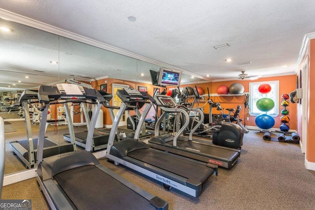 1440 Ocean Boulevard, Unit 119 St. Simons, GA 31522 - Photo 14 of 15 a view of a room with gym equipment