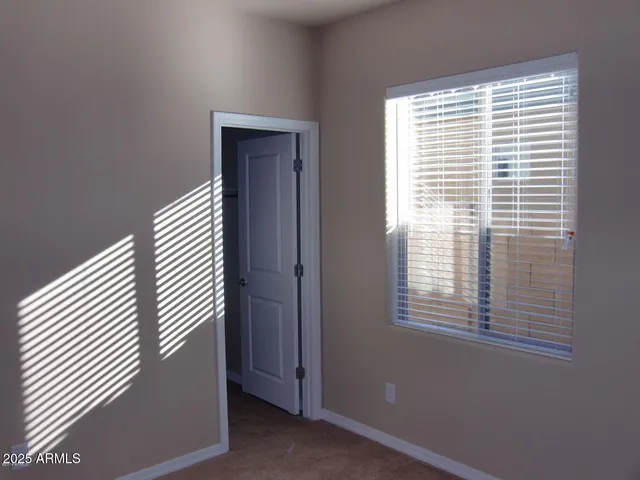 a view of a room that has a window in it
