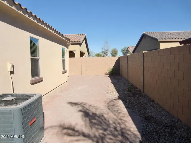 a house view with a backyard space