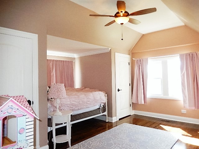11215 79th Street Burr Ridge, IL 60527 - Photo 16 of 25 a bedroom with a bed and a window