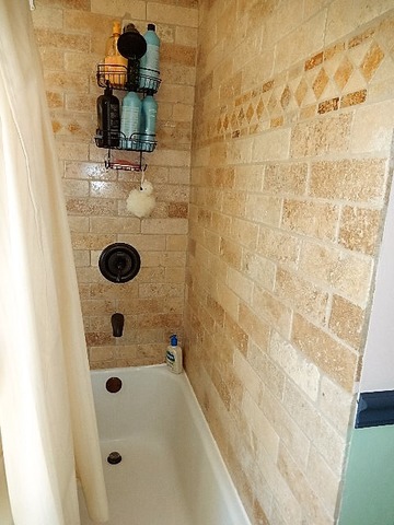 11215 79th Street Burr Ridge, IL 60527 - Photo 18 of 25 a bathroom with a shower