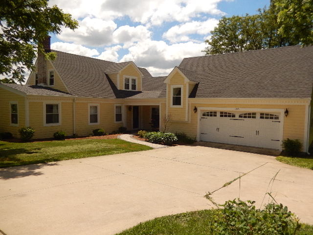 11215 79th Street Burr Ridge, IL 60527 - Photo 2 of 25 a view of a house with a yard