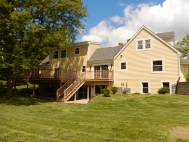 11215 79th Street Burr Ridge, IL 60527 - Photo 21 of 25 a front view of a house with a yard