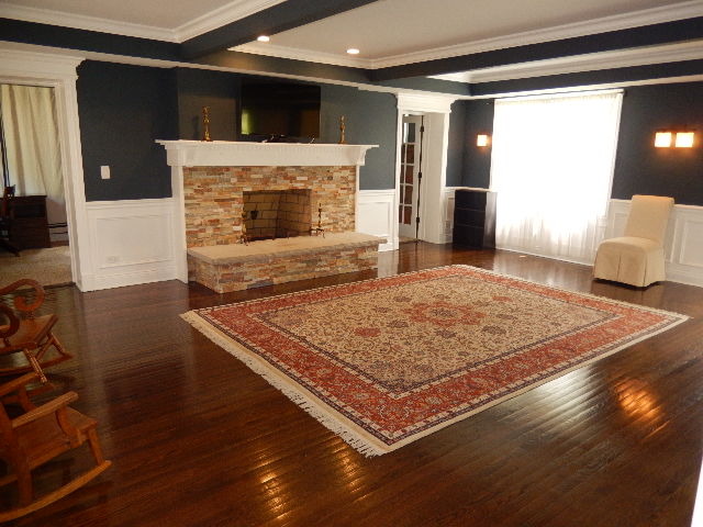 11215 79th Street Burr Ridge, IL 60527 - Photo 3 of 25 a living room with pool table and a fireplace