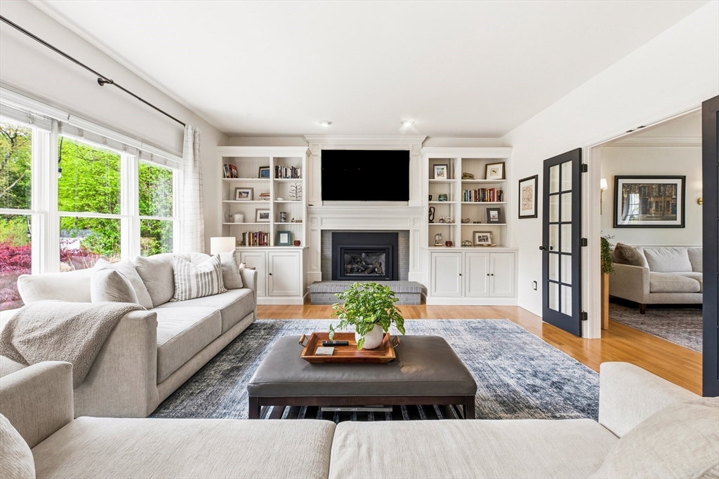 6 Hancock Road Franklin, MA 02038 - Photo 18 of 32 a living room with furniture fireplace and a flat screen tv