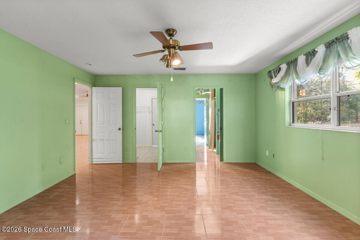 2493 Adamson Road Cocoa, FL 32926 - Photo 31 of 46 a view of an empty room with a window