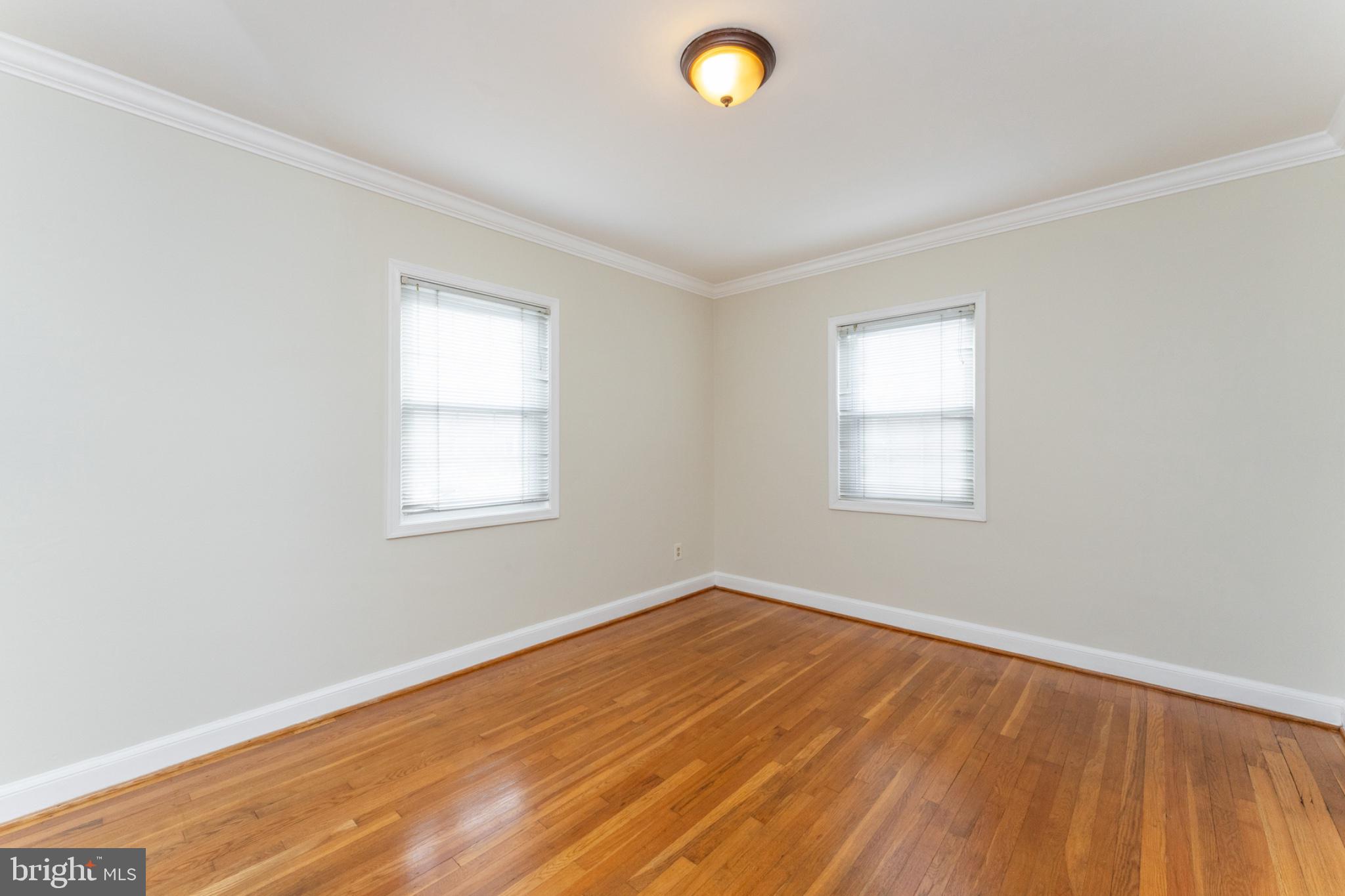 1609 Brisbane Street Silver Spring, MD 20902 - Photo 8 of 24 an empty room with a window