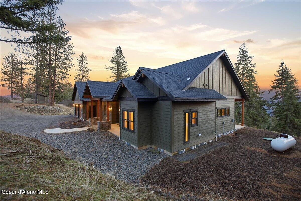 8606 West Bennion Road Coeur D'Alene, ID 83814 - Photo 4 of 86 004-Twilight Front of Home