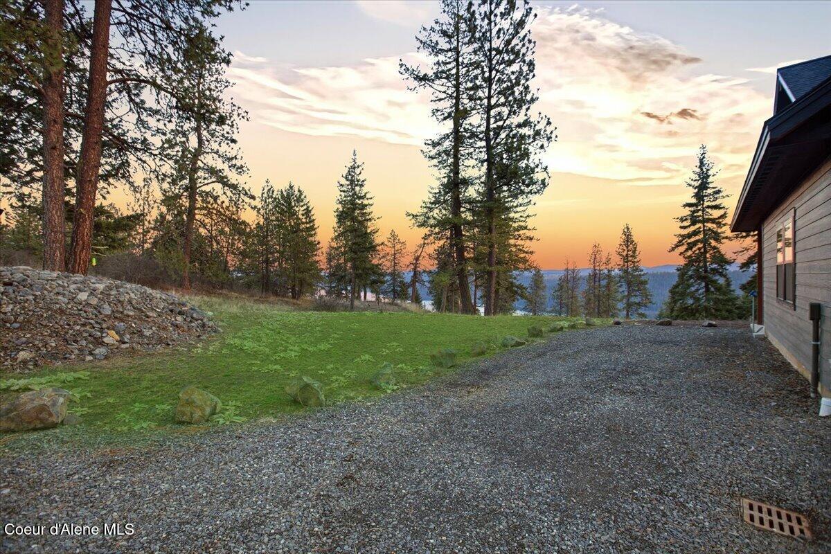 8606 West Bennion Road Coeur D'Alene, ID 83814 - Photo 70 of 86 071-Twilight Back of Home