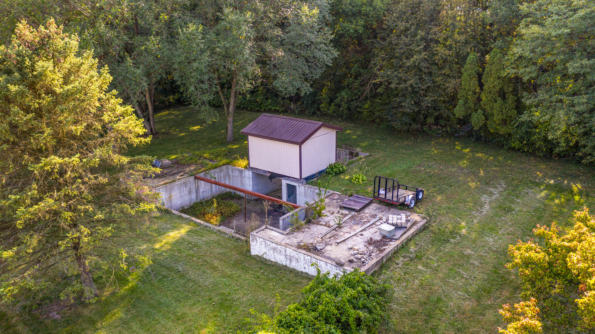 1774 North 4050th Road Sheridan, IL 60551 - Photo 13 of 19 an aerial view of a house with a garden and swimming pool