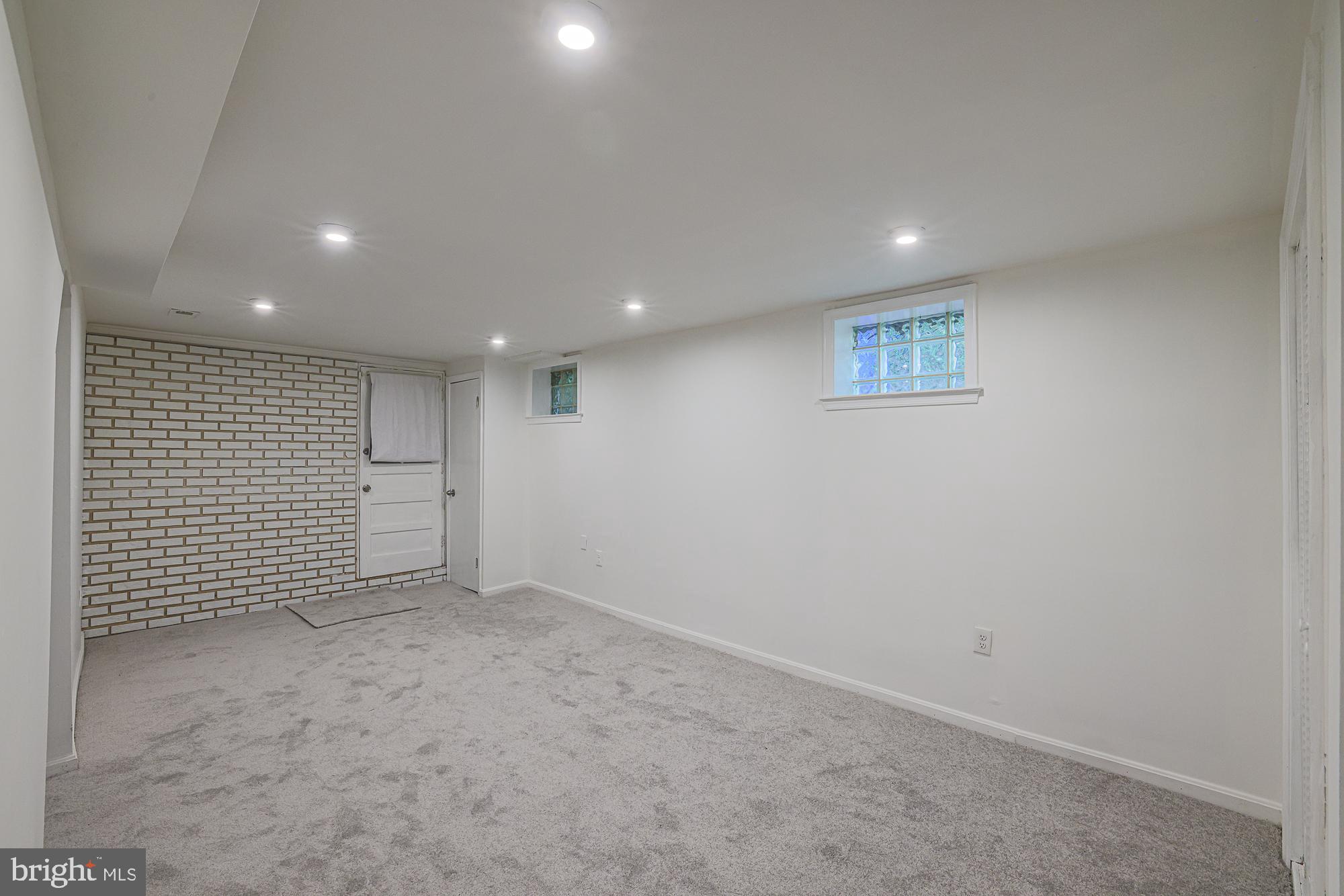 410 Kingston Road Baltimore, MD 21229 - Photo 38 of 56 Basement family room exit to backyard