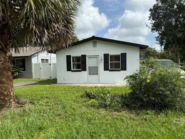 a house view with a garden space