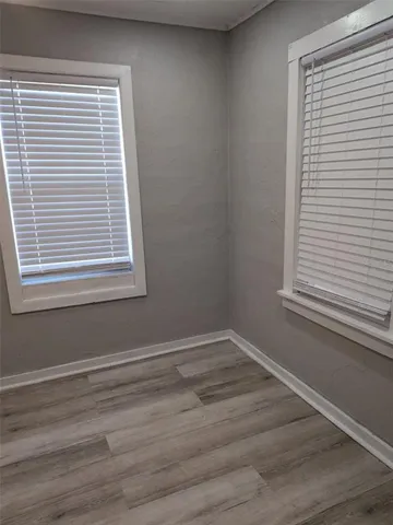 a view of a room that has a window in it