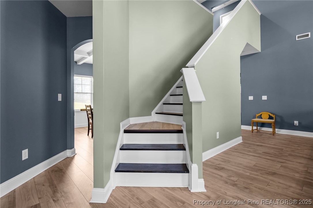 240 Heathrow Drive Spring Lake, NC 28390 - Photo 21 of 47 a view of entryway and hall with wooden floor