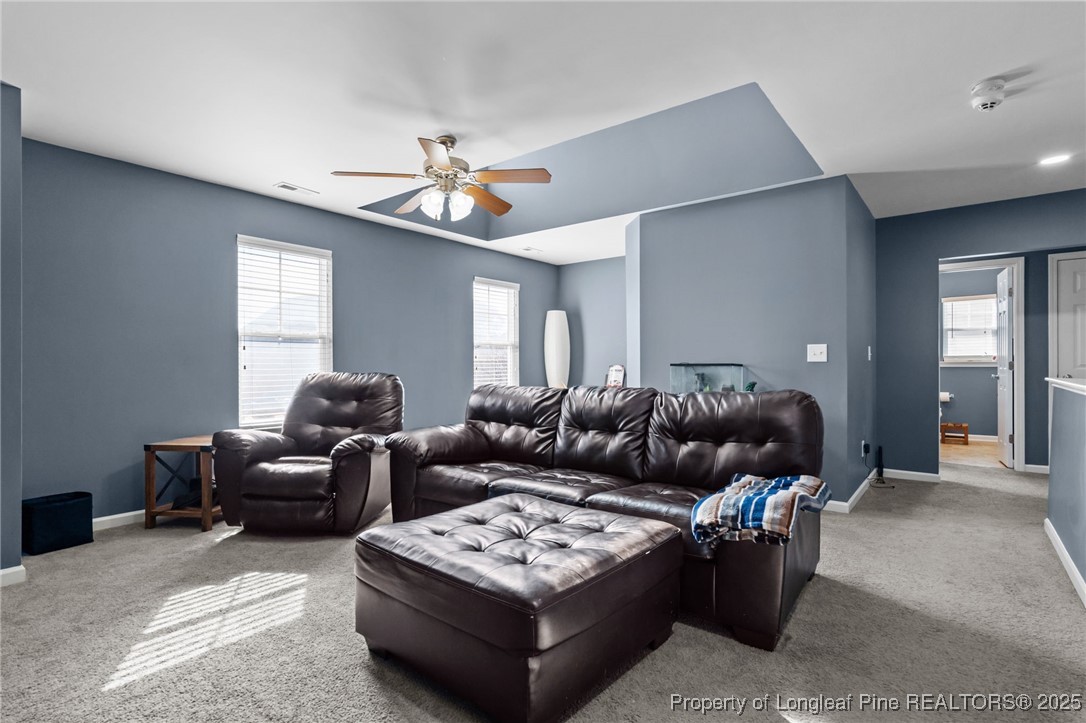 240 Heathrow Drive Spring Lake, NC 28390 - Photo 24 of 47 a living room with furniture a rug and a window