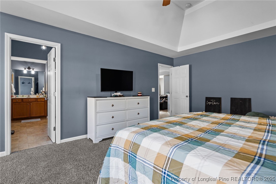 240 Heathrow Drive Spring Lake, NC 28390 - Photo 28 of 47 a bedroom with a bed and a television