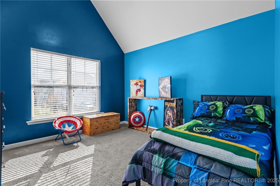 240 Heathrow Drive Spring Lake, NC 28390 - Photo 34 of 47 a bedroom with furniture and a window