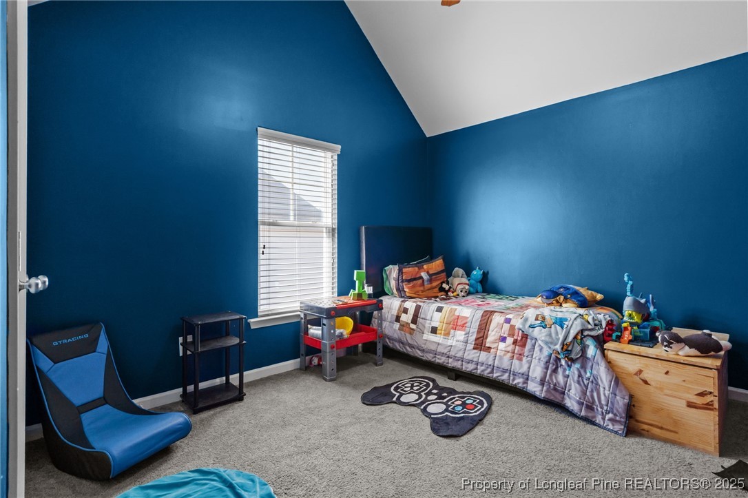 240 Heathrow Drive Spring Lake, NC 28390 - Photo 37 of 47 a bedroom with a bed and a window