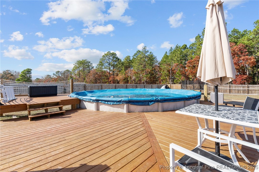 240 Heathrow Drive Spring Lake, NC 28390 - Photo 42 of 47 a view of outdoor space with seating