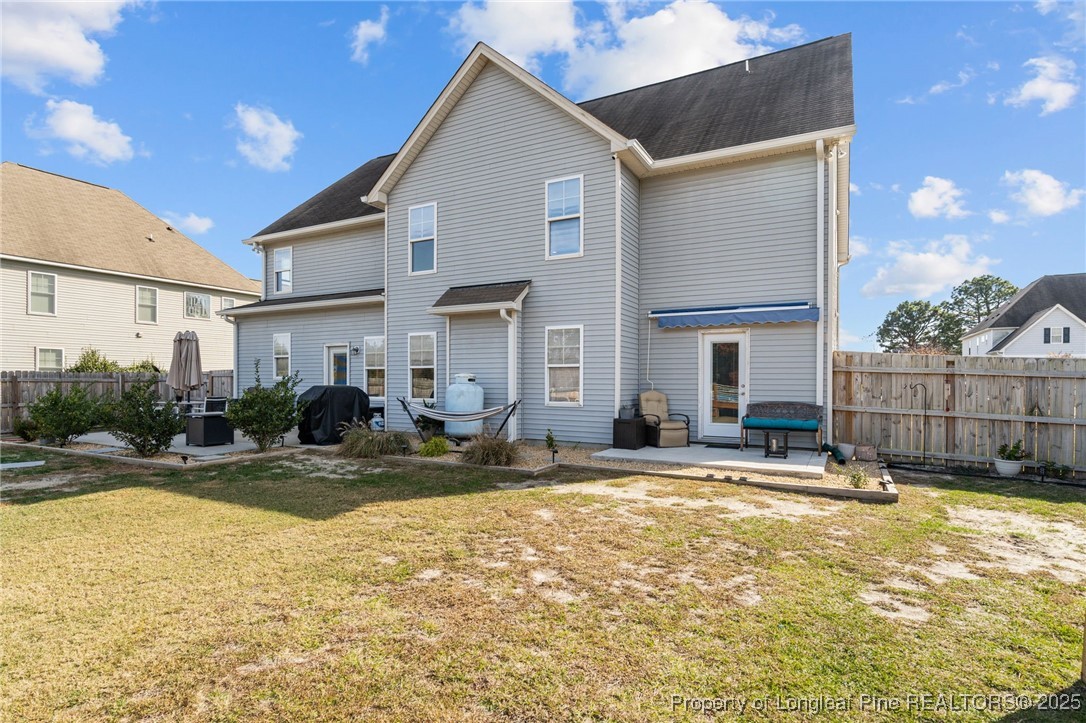 240 Heathrow Drive Spring Lake, NC 28390 - Photo 44 of 47 a view of a house with swimming pool and sitting area